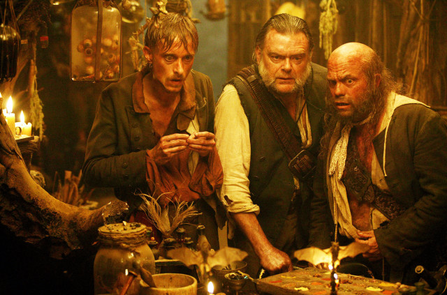 Three men table candles lit free wallpaper for desktop - medium preview image