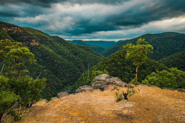 Valley trees mountains cloudy sky free wallpaper for desktop - medium preview image