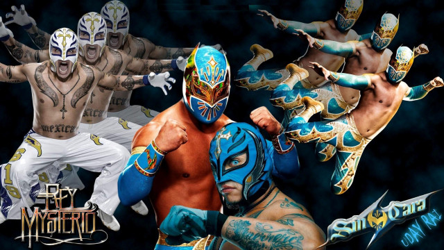 Wrestlers blue yellow costumes arms free wallpaper for desktop - medium preview image