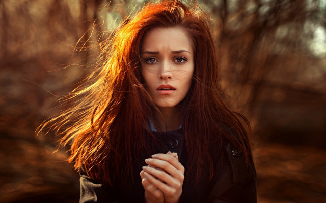 Red haired woman serious look free wallpaper for desktop - medium preview image