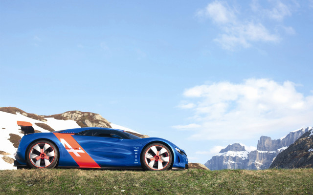 Blue sports car grassy hill #2 free wallpaper for desktop - medium preview image