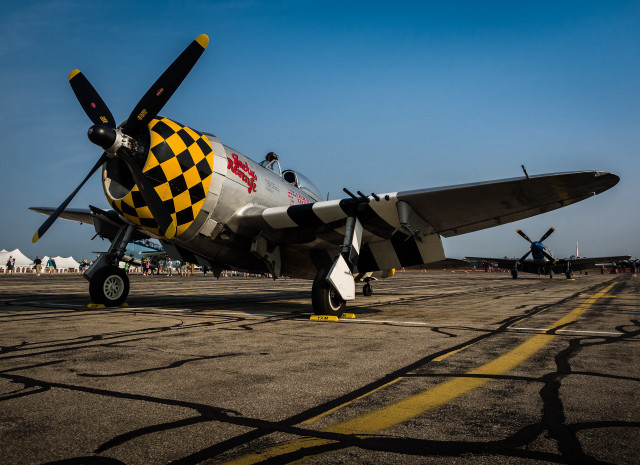 Small plane checkered wing propeller free wallpaper for desktop - medium preview image