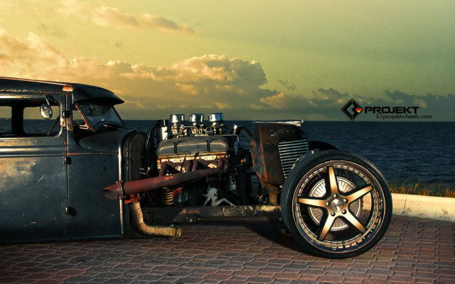 Car parked ocean sky logo free wallpaper for desktop - medium preview image