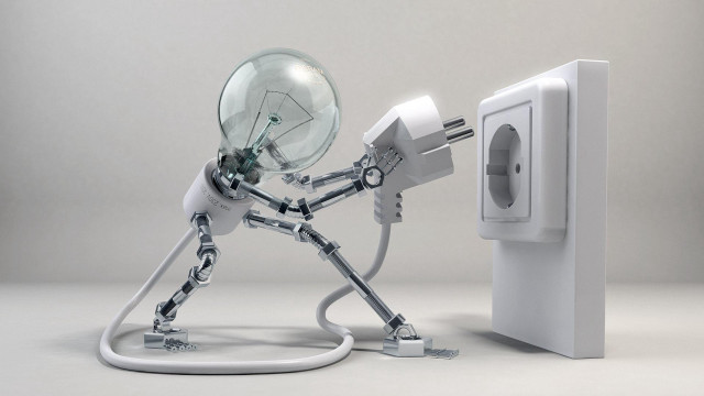Robot holding light bulb plugged #2 free wallpaper for desktop - medium preview image