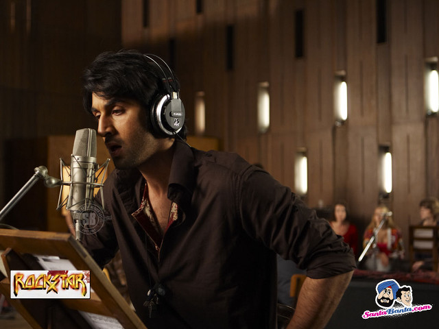 Man headphones microphone stand background free wallpaper for desktop - medium preview image