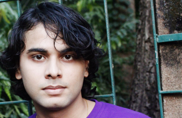 Man purple shirt green fence free wallpaper for desktop - medium preview image