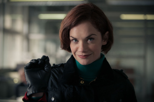 Woman black jacket green sweater free wallpaper for desktop - medium preview image