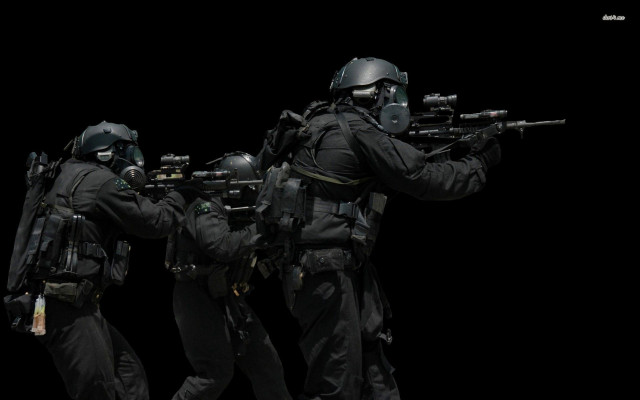 Soldiers black uniforms guns helmets free wallpaper for desktop - medium preview image