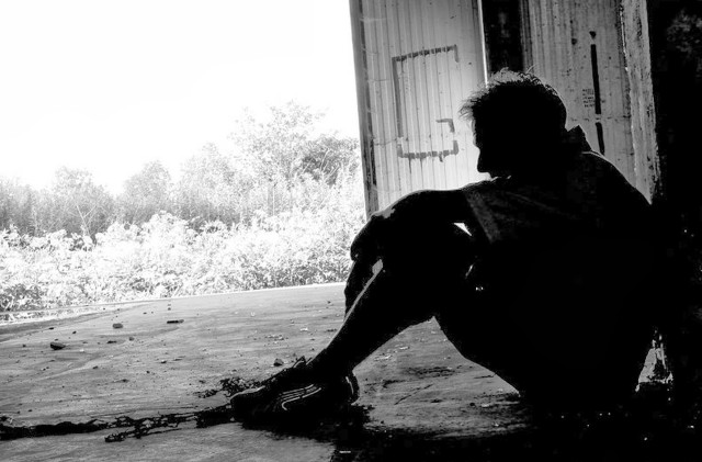 Man sitting ground building door free wallpaper for desktop - medium preview image