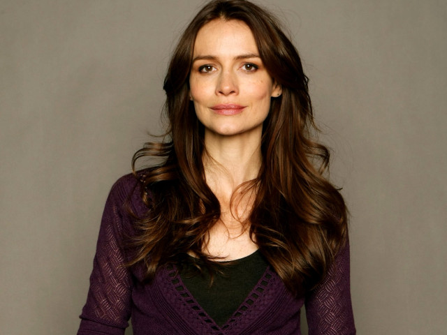 Woman long hair purple sweater free wallpaper for desktop - medium preview image