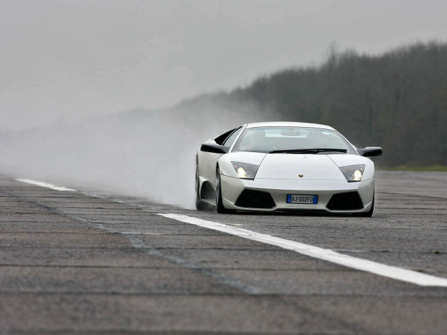 White sports car dusty road free wallpaper for desktop - medium preview image
