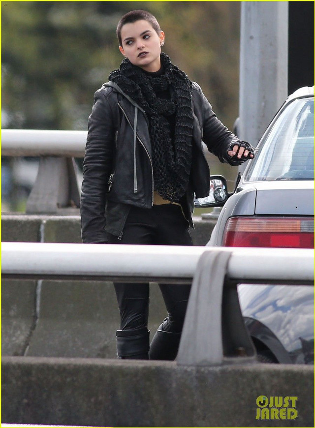 Woman black jacket scarf walking free wallpaper for mobile - medium preview image