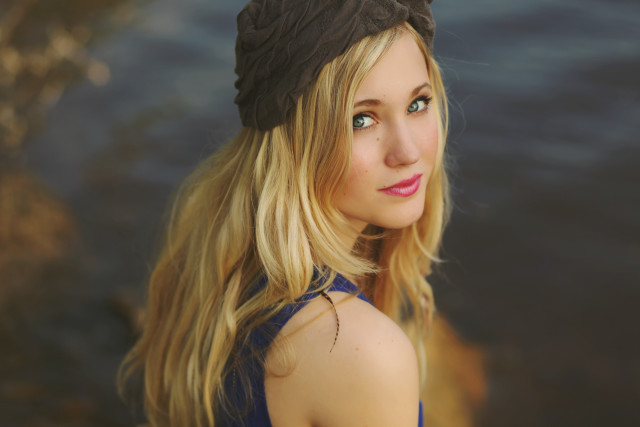 Woman hat water rock background free wallpaper for desktop - medium preview image