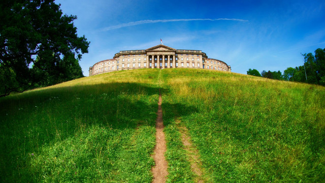 Grassy hill building dirt path free wallpaper for desktop - medium preview image