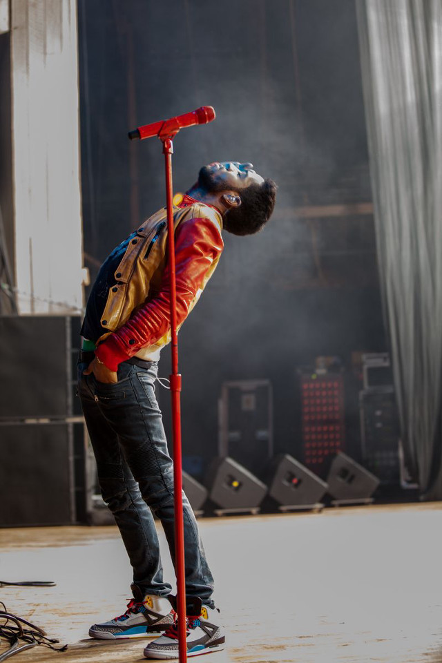 Man skateboard pole microphone standing free wallpaper for mobile - medium preview image