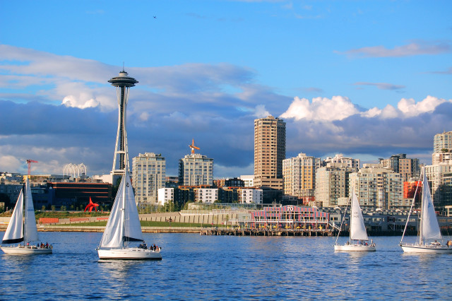 Sailboats city skyline tall buildings free wallpaper for desktop - medium preview image