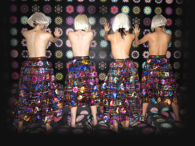 Mannequins colorful skirt black background free wallpaper for desktop - medium preview image