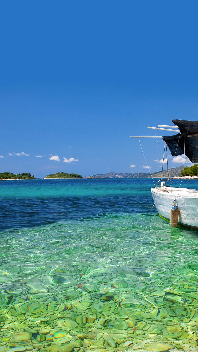 Boat lagoon clear blue water free wallpaper for mobile - medium preview image