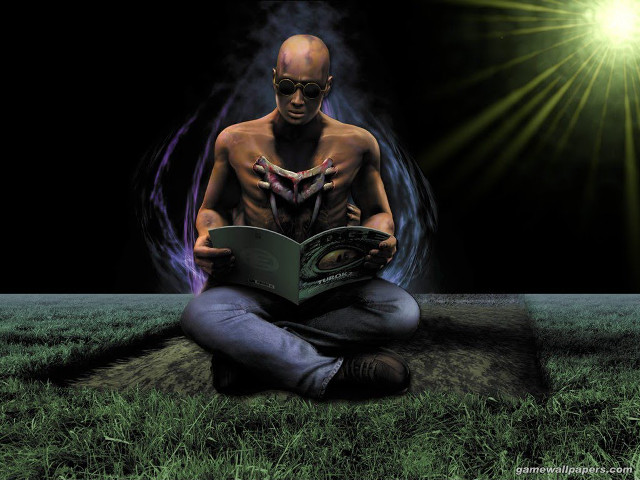 Man sitting ground reading book free wallpaper for desktop - medium preview image