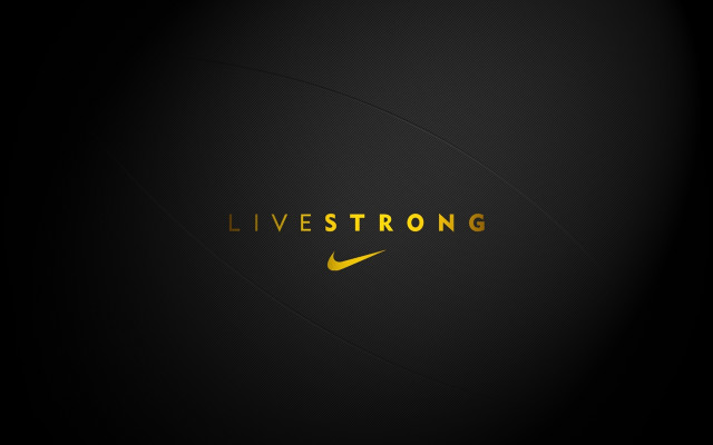 Black background yellow nike logo free wallpaper for desktop - medium preview image