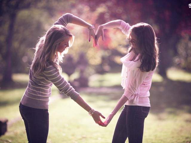 Girls holding hands park trees free wallpaper for desktop - medium preview image