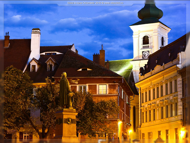 Statue man courtyard building clock free wallpaper for desktop - medium preview image