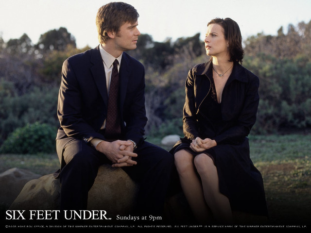 Man woman sitting rock park free wallpaper for desktop - medium preview image