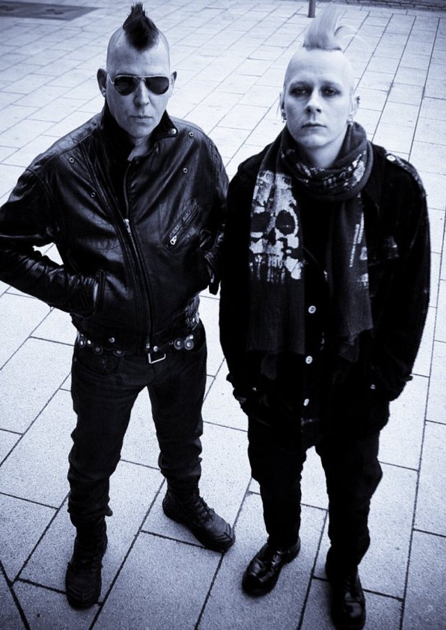 Two men sidewalk clock mohawk free wallpaper for mobile - medium preview image