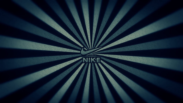 Nike logo dark background sunburst free wallpaper for desktop - medium preview image