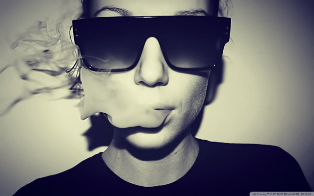 Man sunglasses cigarette blowing mouth free wallpaper for desktop - medium preview image