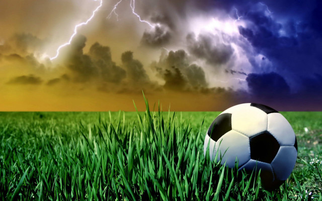 Soccer ball grass storm cloud #2 free wallpaper for desktop - medium preview image