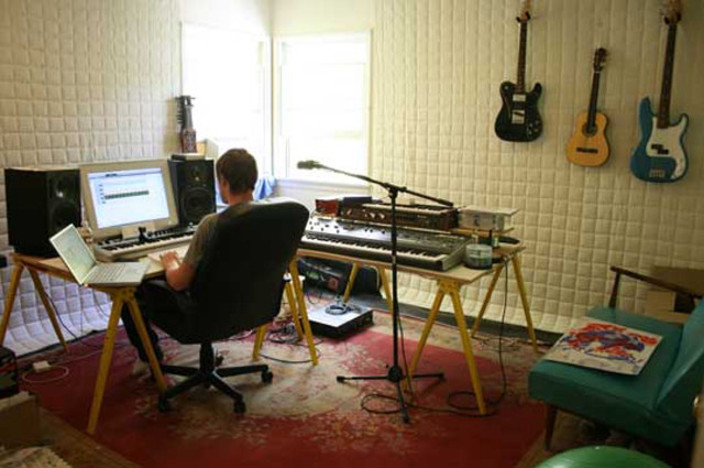 Man sitting desk keyboard monitor free wallpaper for desktop - medium preview image