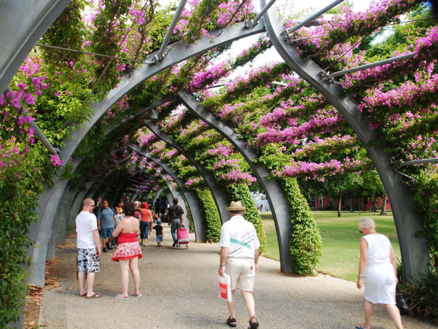 Flower garden park people walking free wallpaper for desktop - medium preview image