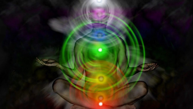 Person sitting lotus chakra light free wallpaper for desktop - medium preview image