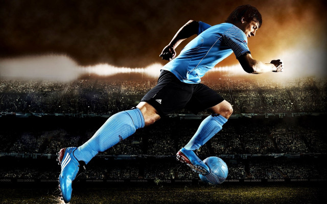 Soccer player kicking stadium night free wallpaper for desktop - medium preview image