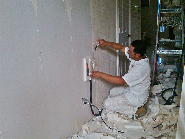 Man painting wall paint roller free wallpaper for desktop - medium preview image