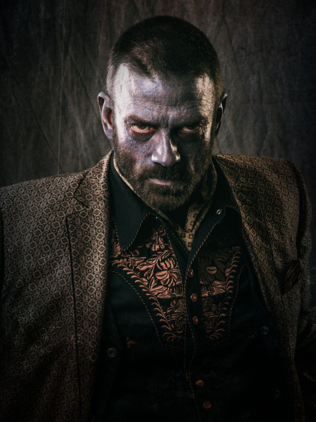 Creepy man serious coat looking free wallpaper for mobile - medium preview image