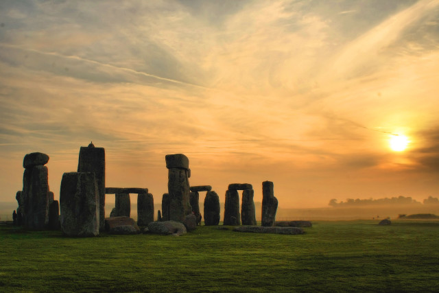 Stonehenges sunset field clouds sky free wallpaper for desktop - medium preview image