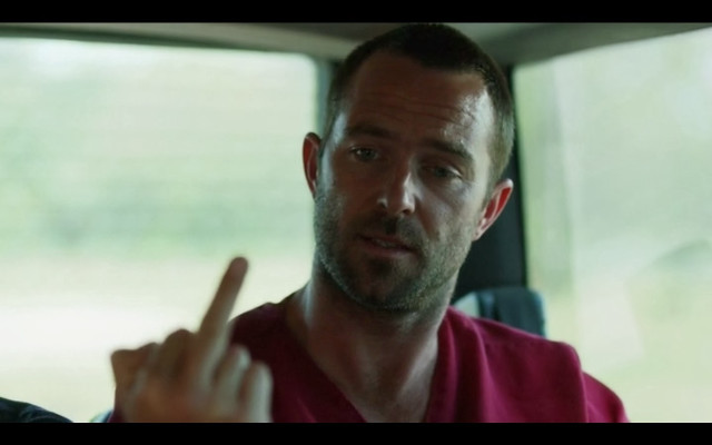 Man red shirt pointing air free wallpaper for desktop - medium preview image