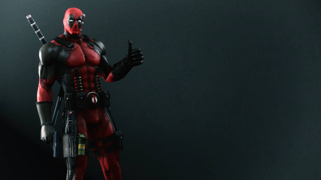 Deadpool gun pointing action character free wallpaper for desktop - medium preview image