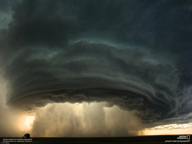 Storm cloud field distance sky free wallpaper for desktop - medium preview image