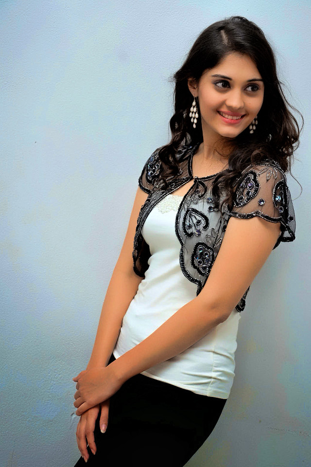 Woman white top black pants free wallpaper for mobile - medium preview image