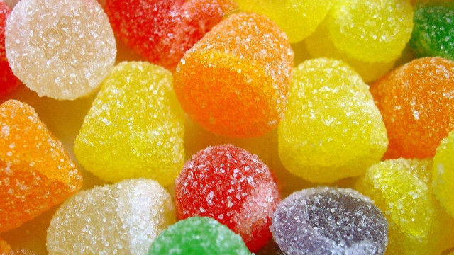 Gummy bears closeup pile white free wallpaper for desktop - medium preview image