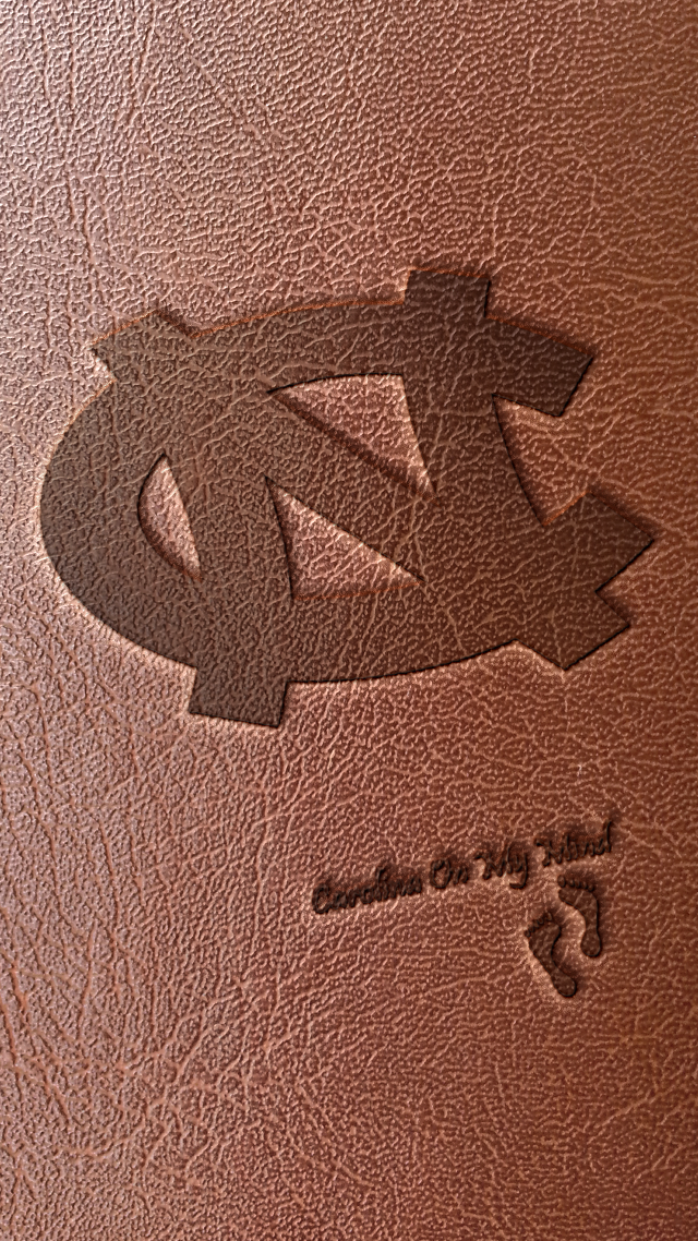 Brown leather cover logo black free wallpaper for mobile - medium preview image