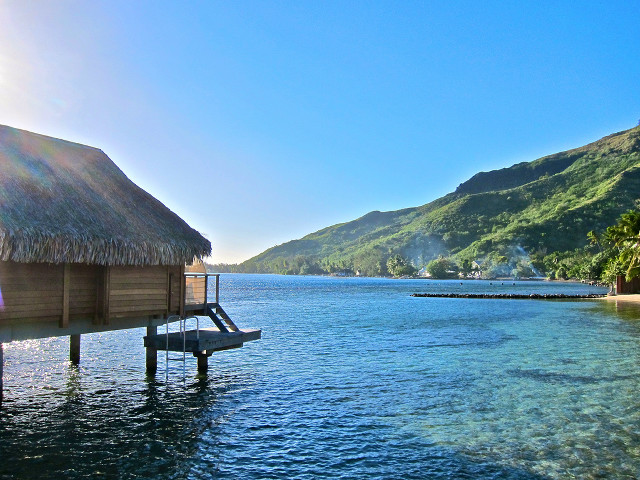 Dock thatched roof mountain water free wallpaper for desktop - medium preview image