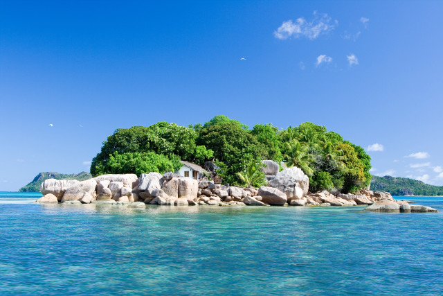 Small island rocks water trees free wallpaper for desktop - medium preview image