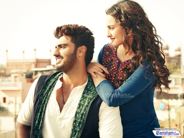 Man carrying woman city buildings free wallpaper for desktop - medium preview image