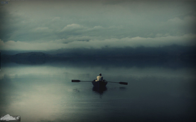 Person boat lake cloudy sky free wallpaper for desktop - medium preview image