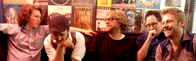 Men sitting wall posters group free wallpaper for desktop - medium preview image