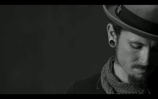 Man hat scarf earrings looking free wallpaper for desktop - medium preview image